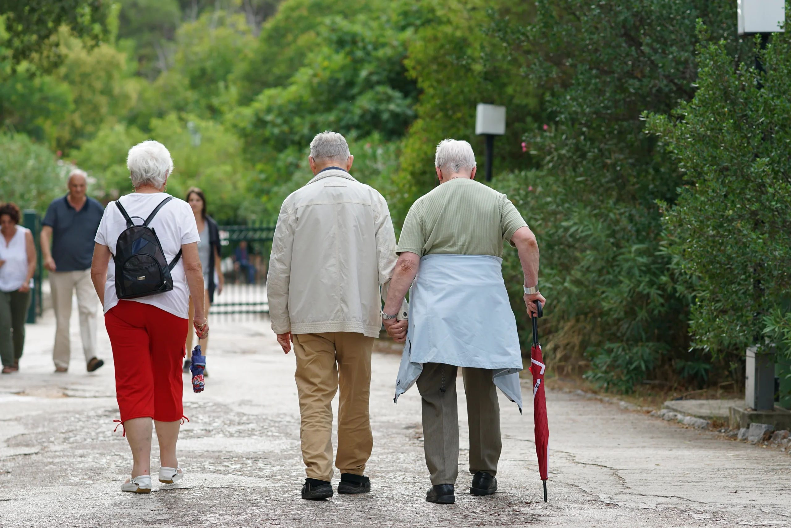 Elderly tourists visiting the archaeological site of Epidaurus
